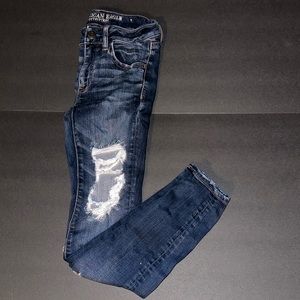 American Eagle Outfitters dark wash super stretch low mid rise distressed jeans